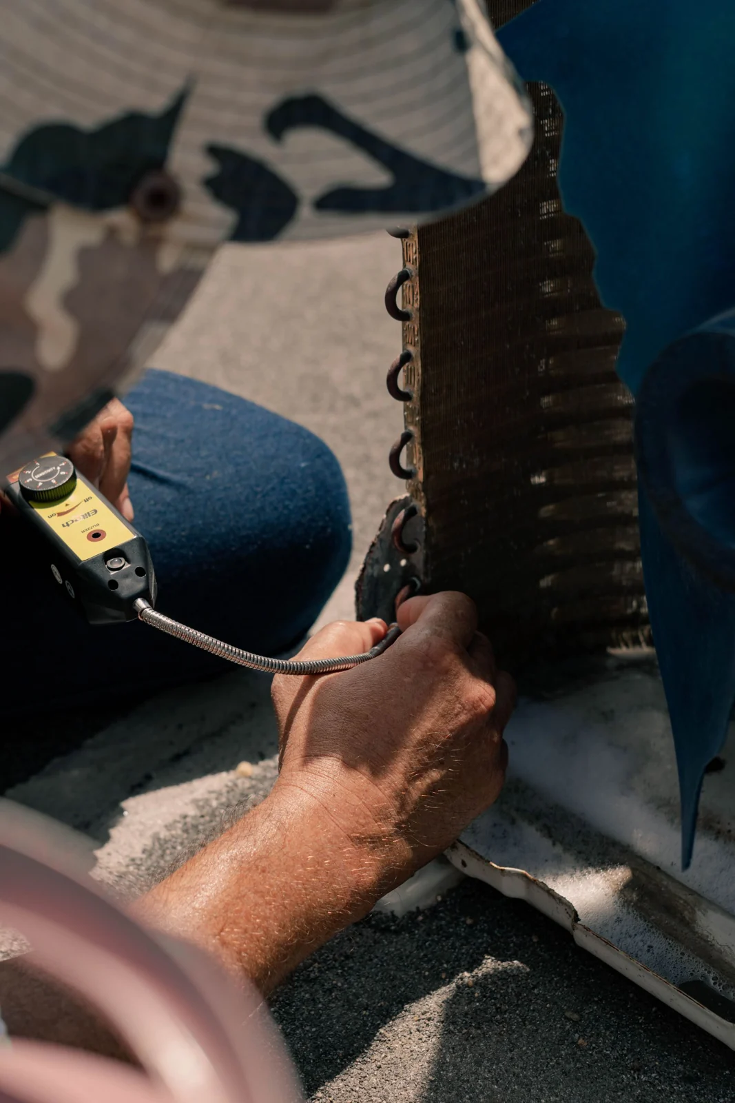 Close-up of tools and an air conditioning service inspection